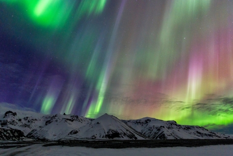 A Colourful Display Dazzling Over The Mountain Tops